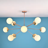 12 opal glass sputnik chandelier in solid brass with mid century modern radial design, warm ambient ceiling lighting