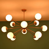 12 opal glass sputnik chandelier in copper brass tone finish with warm glowing globe shades