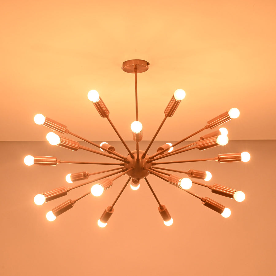 Front view of 24 light brass sputnik chandelier with symmetrical arms and warm ambient lighting.