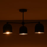Soft glowing 3 light brass chandelier creating a cozy and inviting atmosphere.