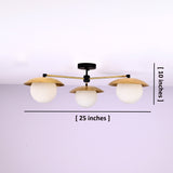 3 light brass disc flush mount ceiling light showing 25 inch width and 10 inch height with opal glass globes.