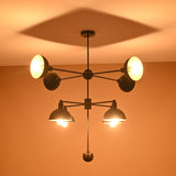 8-Light Black and Gold Modern Chandelier – Brass Pendant Illuminated in Warm Ambient Tone
