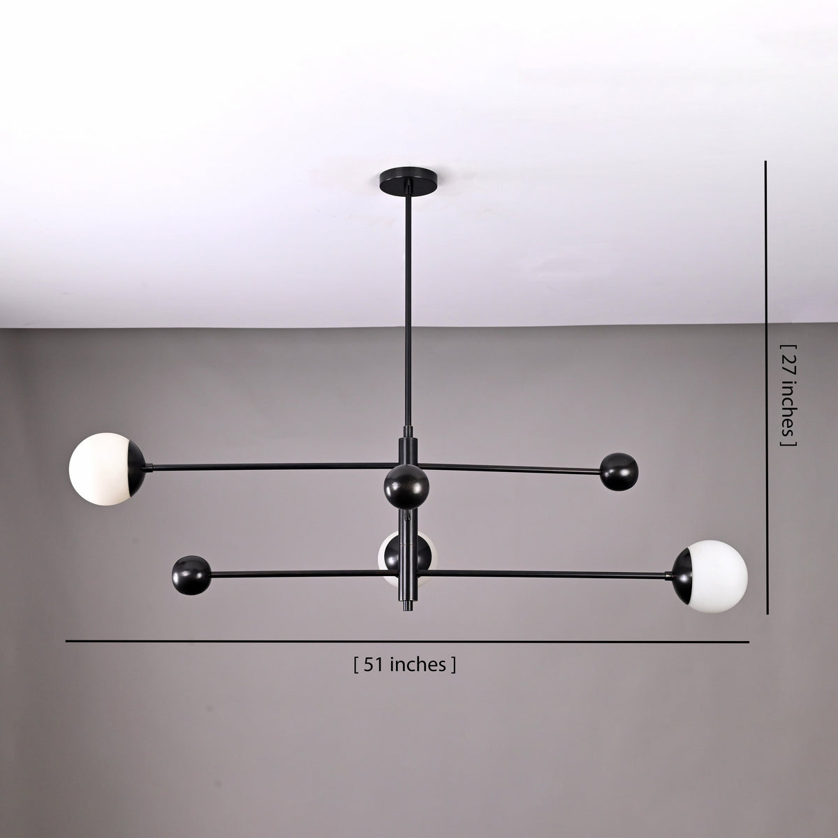 Matte black 3-light balance chandelier with 51-inch width and 27-inch height dimensions