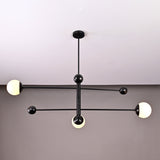 Contemporary 3-light black brass chandelier with spherical opal glass globes – side angle