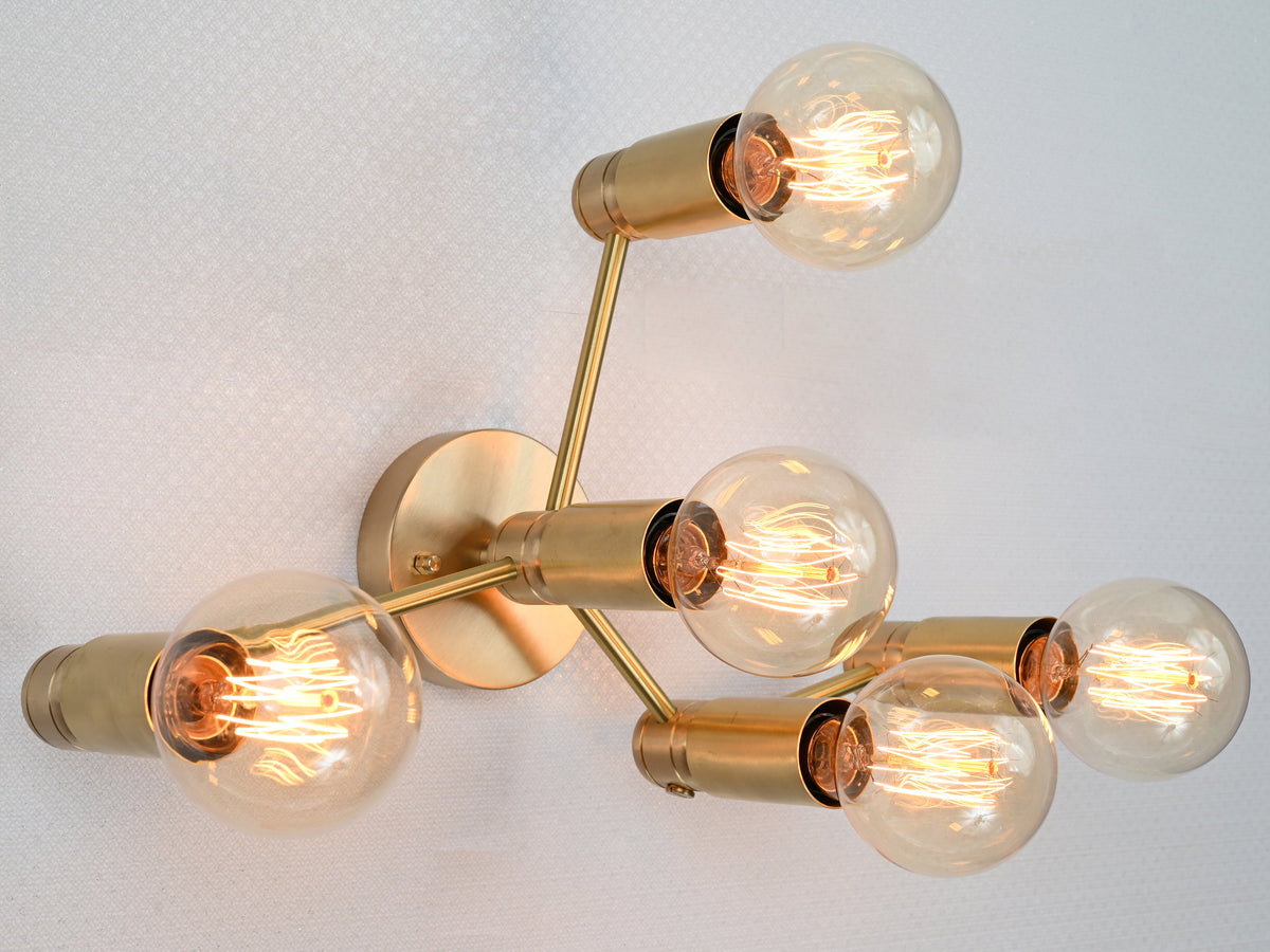 Berlin Axis 5-light brass wall sconce by Brass Leaf Studio
