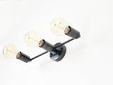 Berlin Axis mid-century brass wall sconce front view
