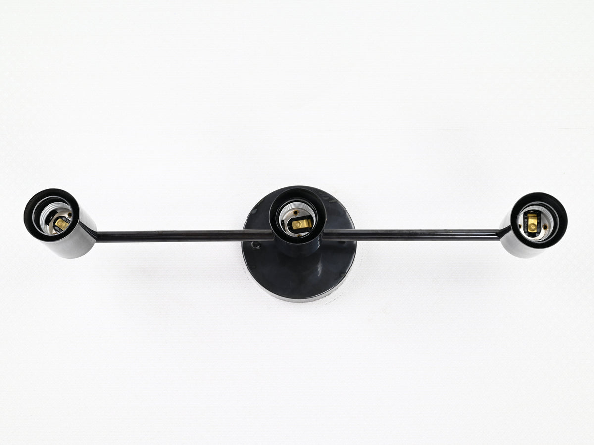 Custom finish three-light brass wall sconce