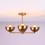 Front view of a handcrafted 4 bowl brass chandelier in brushed brass finish, featuring a minimalist flush mount ceiling design with warm ambient lighting.
