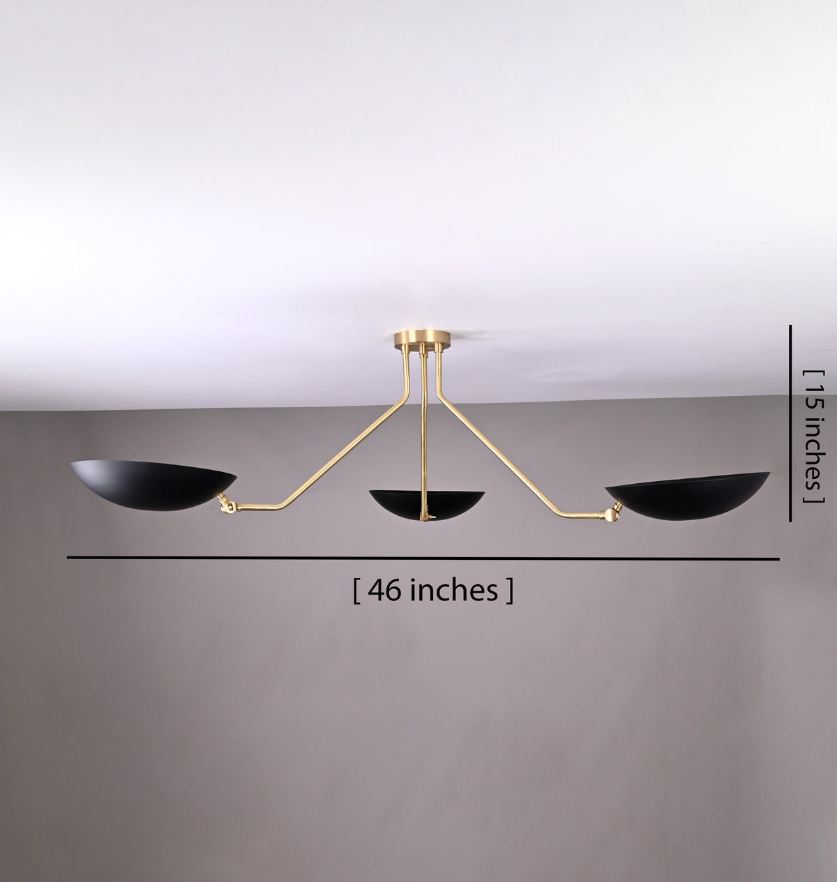 46-inch wide black and brass bowl chandelier with 15-inch height measurement shown, featuring three adjustable arms.