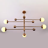 Five light globe chandelier product view with opal glass shades and modern linear brass frame