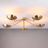Angled view of handcrafted 5-light brass ceiling chandelier featuring bowl-shaped shades and minimalist arms.