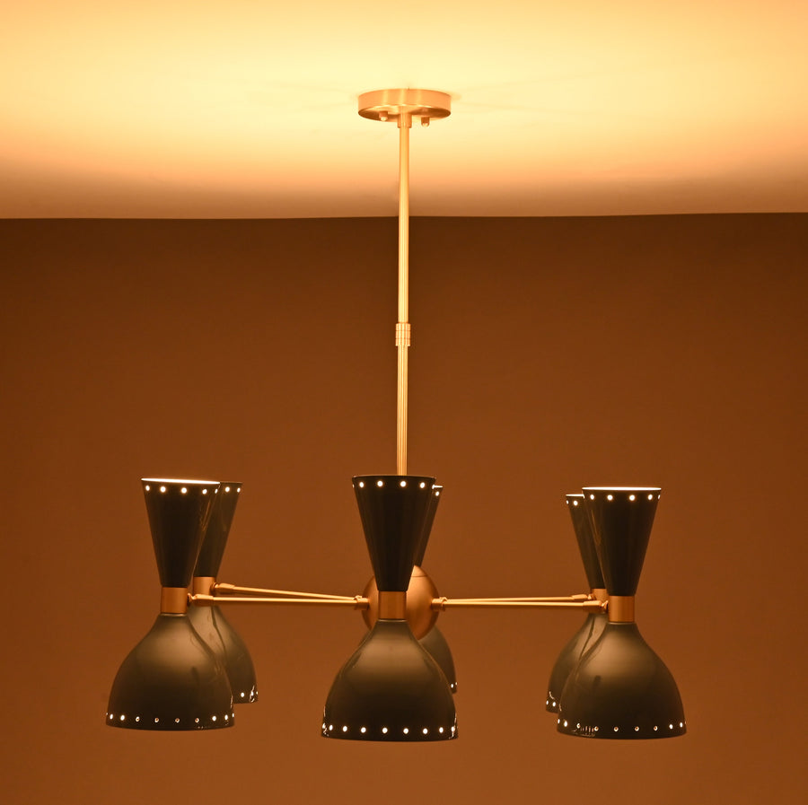 Angled view of 6 Brass Diabolo 12-light chandelier featuring solid brass arms and sculptural diabolo metal shades