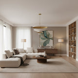 Athens 8 light layered disc chandelier shown from the front with sculptural ivory shades and elegant brass accents.