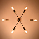 Bottom view of Athens Sputnik six-light ceiling fixture with glowing bulbs and symmetrical starburst arrangement.