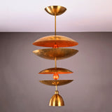 Aurelia Tiered Disc Chandelier shown on plain background with sculptural layered design and ceiling canopy.