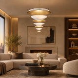 Berlin 9 light white and brass layered disc chandelier shown from the front with a sculptural vertical tiered design.