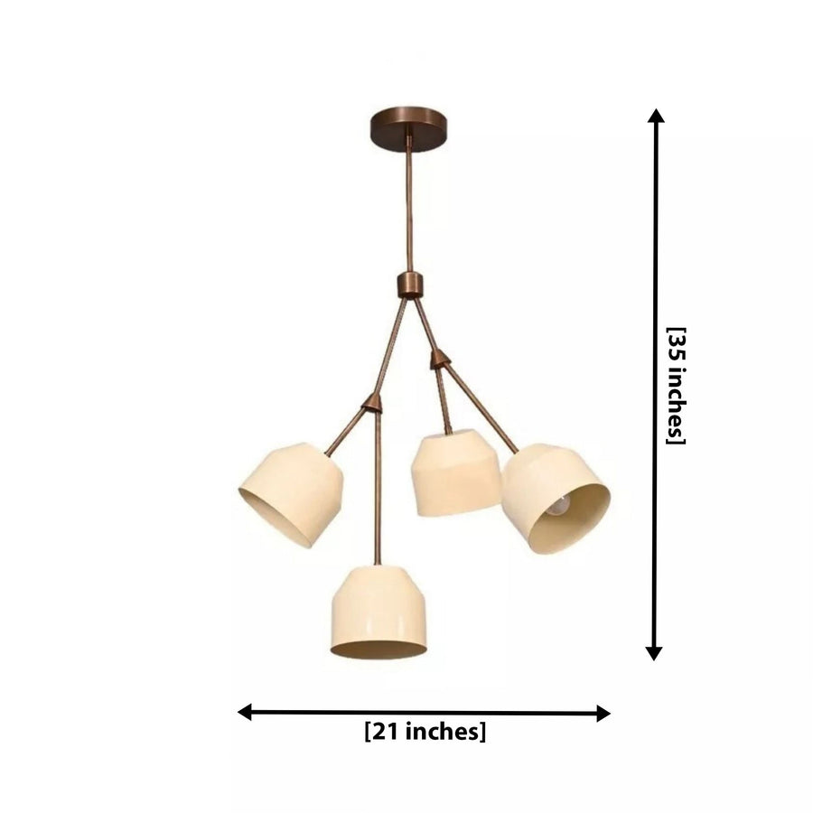 Charleston 4 light cream shade chandelier illuminated in a warm contemporary living room with sculptural bronze-tone branching arms.