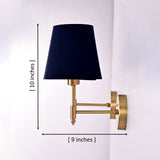 Dimension diagram of the antique brass wall sconce with a rich blue tapered fabric shade measuring 10 inches in height and 9 inches in projection.