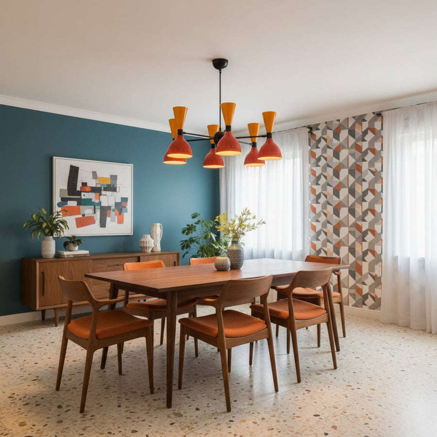 Edinburgh 12 light Mid-Century Modern chandelier with orange and red two-tone metal shades and black multi-arm frame shown from the front.