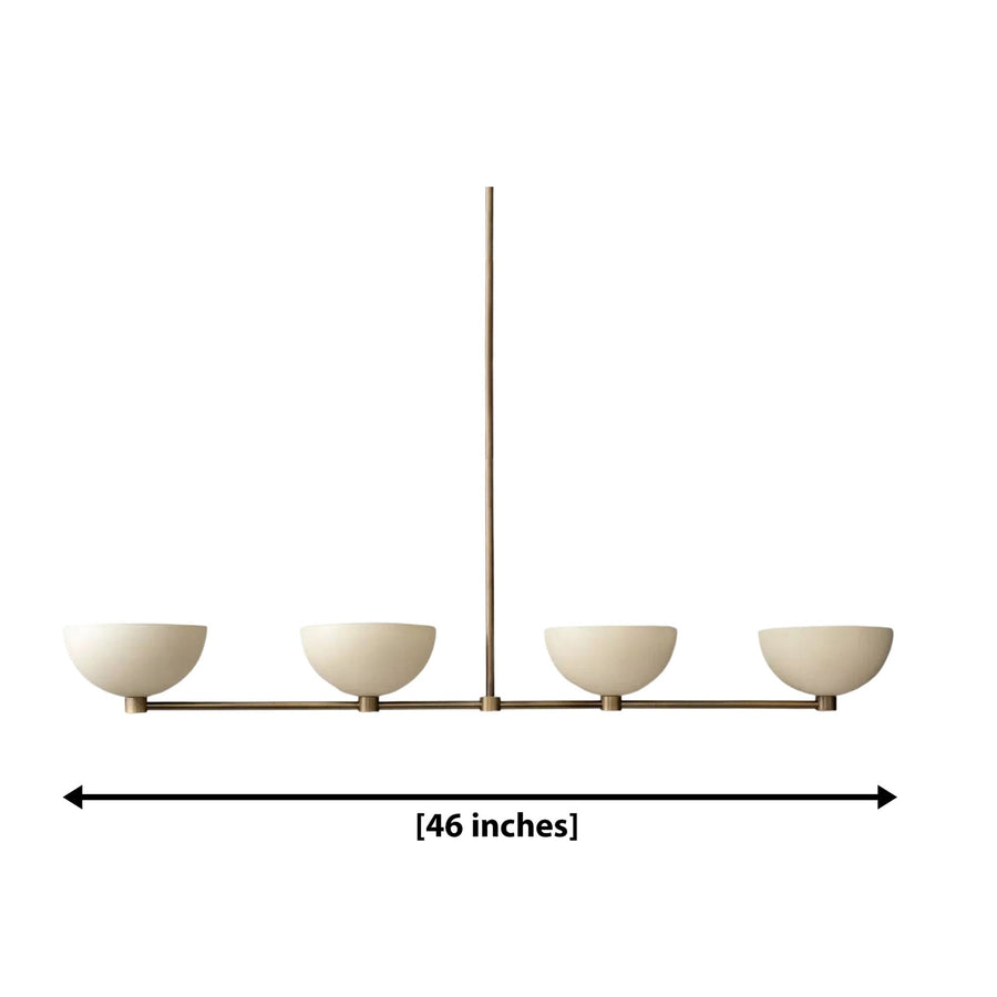 Florence 4 light cream bowl chandelier illuminated above a dining table in a warm contemporary dining room.