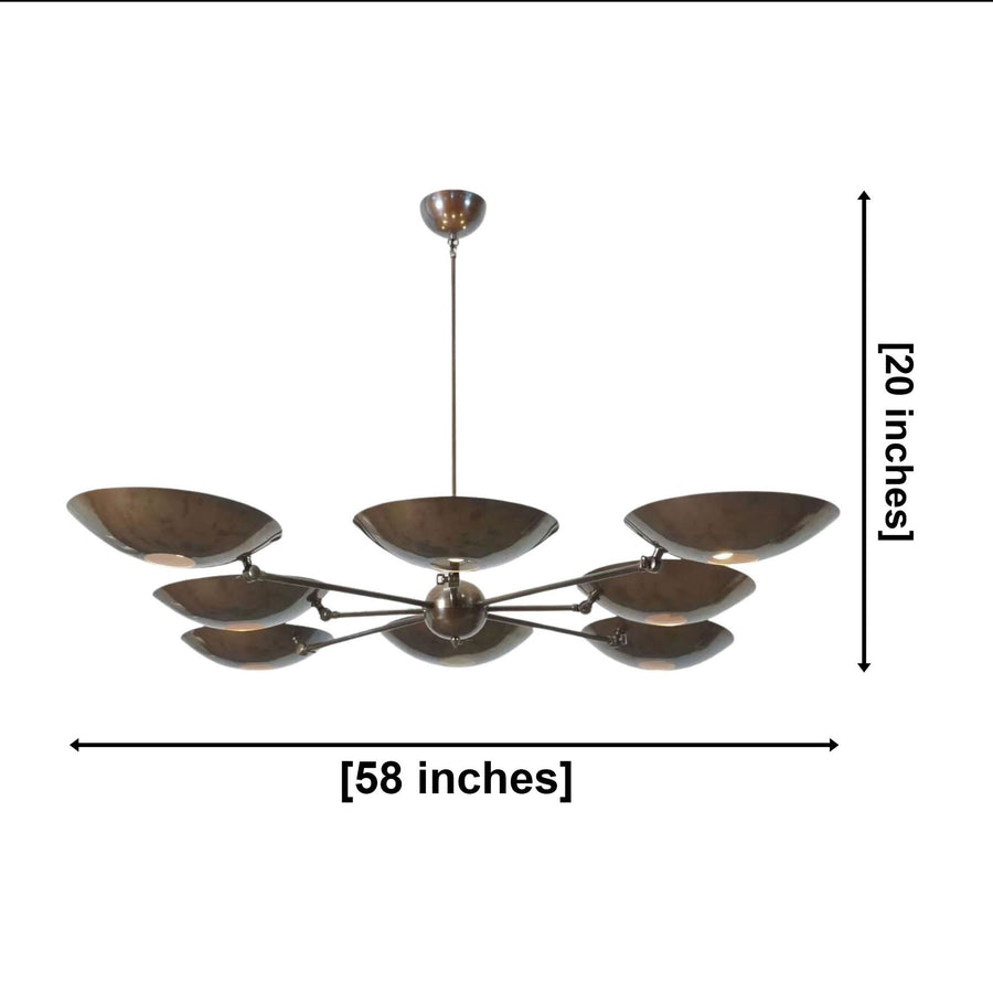 Florence 8 light dark bronze sculptural bowl chandelier installed in a modern living room with warm ambient lighting.