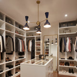 Hamburg 6 light Sputnik chandelier shown from the side highlighting navy blue double-cone shades and brass arms.