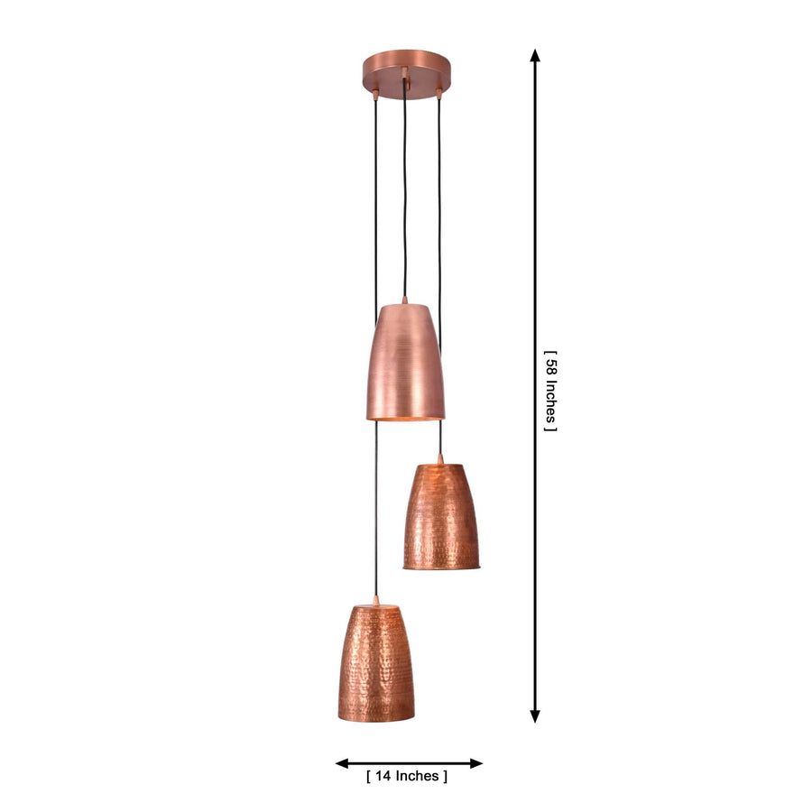 Hudson Cascading Cone Cluster Pendant Light installed in a contemporary living room above a seating area, adding warm ambient lighting and modern handcrafted style.