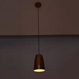 Hudson modern copper bell pendant lamp casting warm ambient light with adjustable ceiling suspension