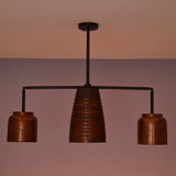 Unlit Hudson Modern Linear Three Shade Chandelier featuring a ribbed center shade, two cylindrical side shades, and a minimalist linear frame.