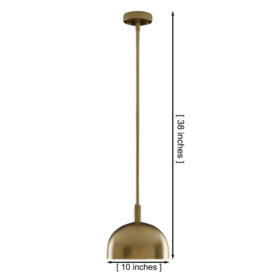 Marlow brass dome pendant light installed above a modern dining table, providing warm ambient illumination in a Scandinavian-inspired dining room.