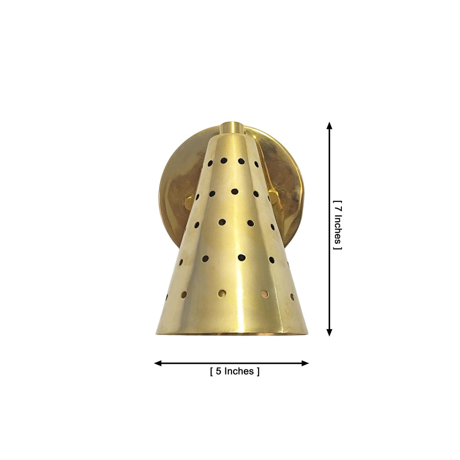 Milan perforated brass cone wall sconce installed beside bed with warm ambient lighting – Model 32771