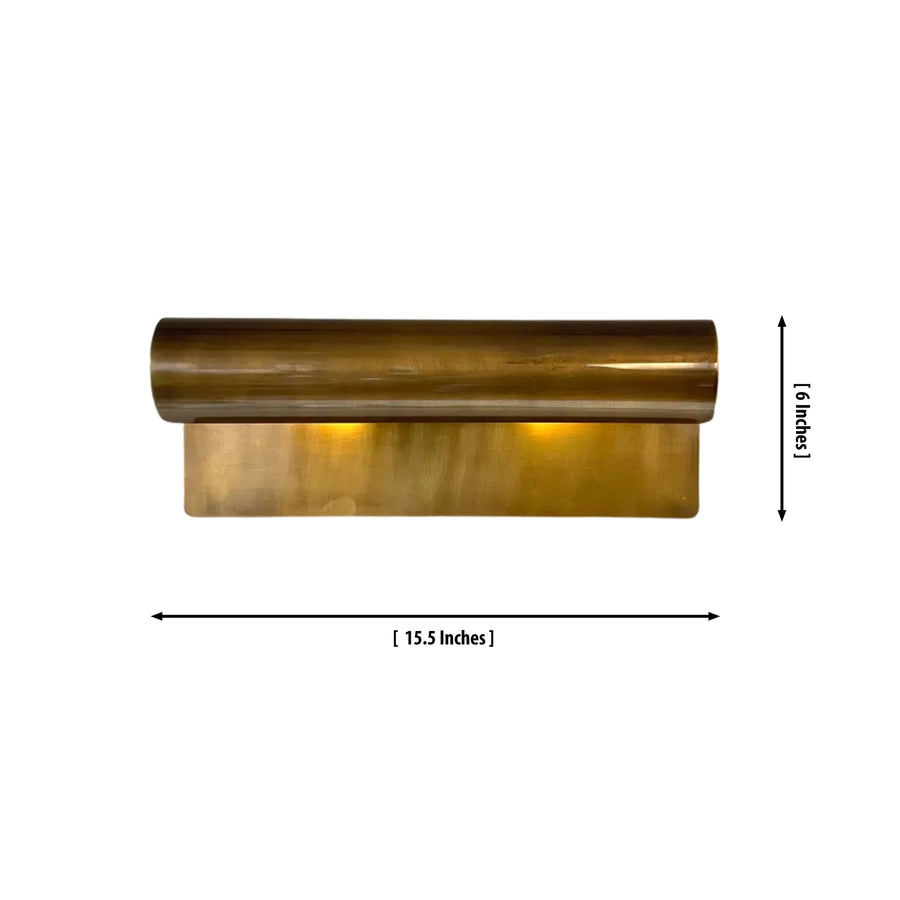 Milan Modern Picture Light installed above a bathroom vanity, providing warm focused illumination with a modern solid brass finish in a contemporary interior.