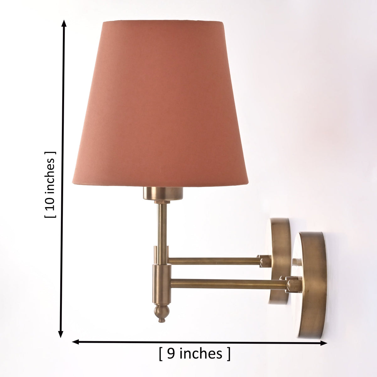 Dimensions of Milan Peach Shade Antique Brass Short Wall Sconce measuring 10 inches high with a 9-inch projection.