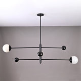 Modern 3-light matte black orb balance chandelier with brass arms – front view