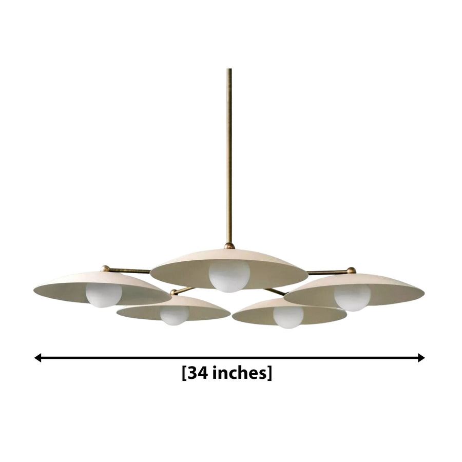 Munich 5 light Mid-Century Modern chandelier shown from an angled view with ivory saucer shades and white globe diffusers.
