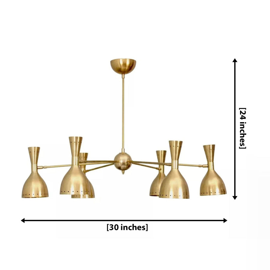 Naples 6 light brass-tone chandelier illuminated in an elegant modern living room with warm ambient lighting.