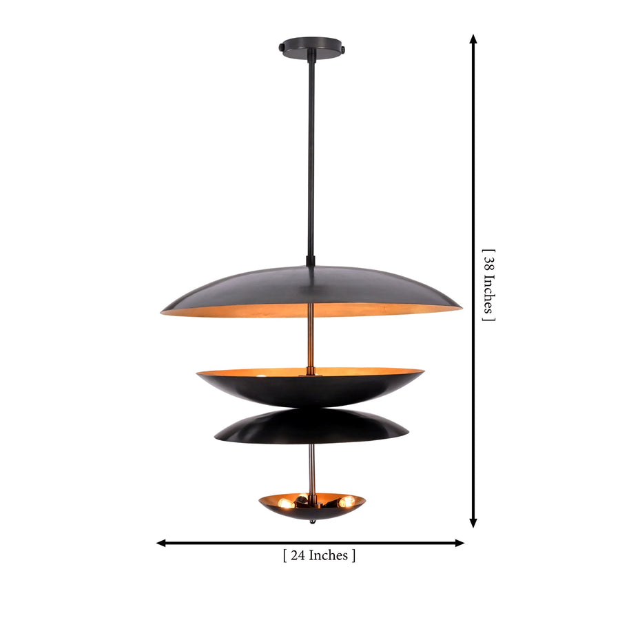 Noir Tiered Disc Chandelier installed above a round dining table in a warm modern interior.