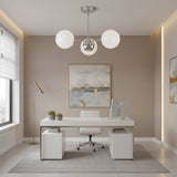 Notting Hill 3 light opal globe chandelier shown from an angled view with white spherical glass shades and silver-tone metal frame.