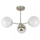 Notting Hill 3 light Mid-Century Modern chandelier shown in a close product view with opal white globe shades and polished silver-tone frame.
