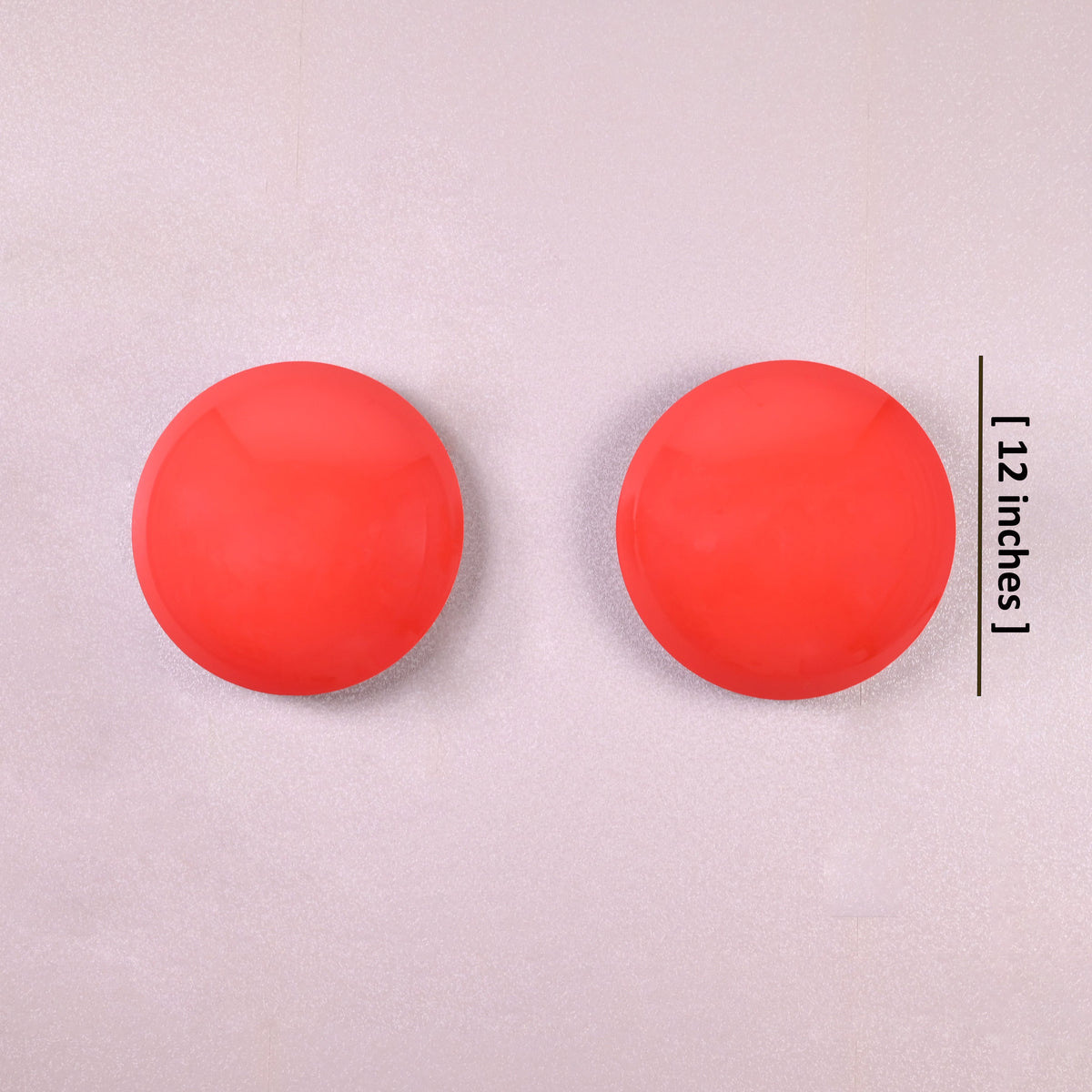 Two red circular wall sconces, 12-inch diameter each, handmade brass wall lights with minimalist design