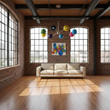 Providence 8 light multicolor Sputnik chandelier shown from the front with green, yellow, red, pink, purple, navy and blue rounded shades.