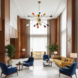 Reykjavik 18 light brass tone Sputnik chandelier with colorful tapered cone shades on a white background.