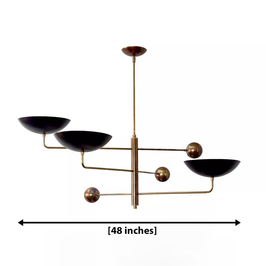 Seoul 3 light counterbalance chandelier shown from an angled view with three wide bowl shades and decorative spherical counterweights.