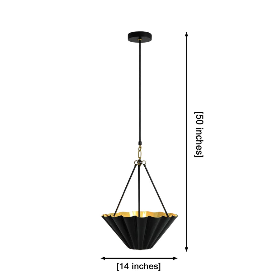 Sloane fluted bowl pendant light installed in a modern living room, providing warm ambient illumination with its brushed brass interior and sculpted black metal shade.