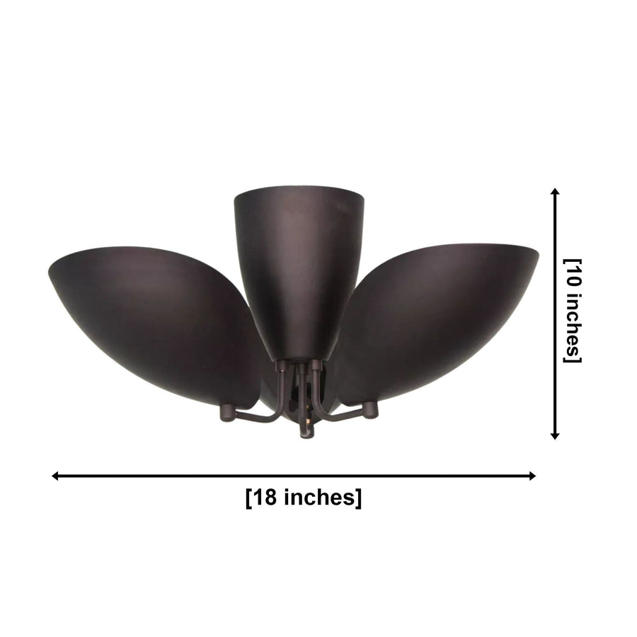 Sloane dark bronze sculptural petal flush mount installed on ceiling in a warm modern bedroom interior