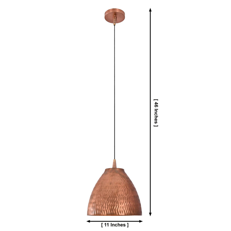 Sutton hammered bell pendant light installed above a modern kitchen island, adding warm lighting and rustic industrial elegance to the space.