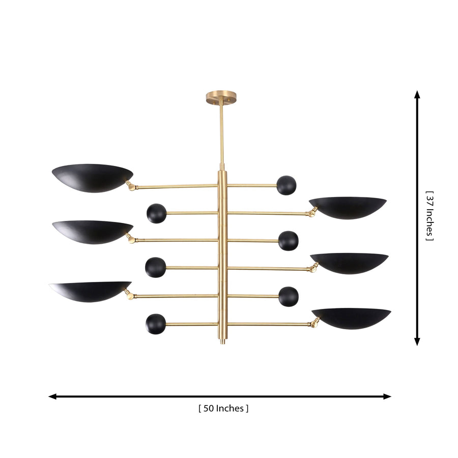 Turin Disc Balance Chandelier styled in a luxury bedroom with warm lighting and modern interior décor.