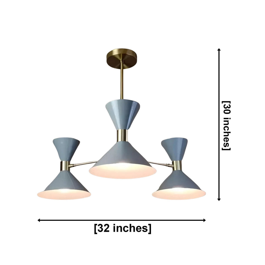 Valencia 6 light blue-gray and brass triple cone chandelier illuminated in a warm modern living room interior.