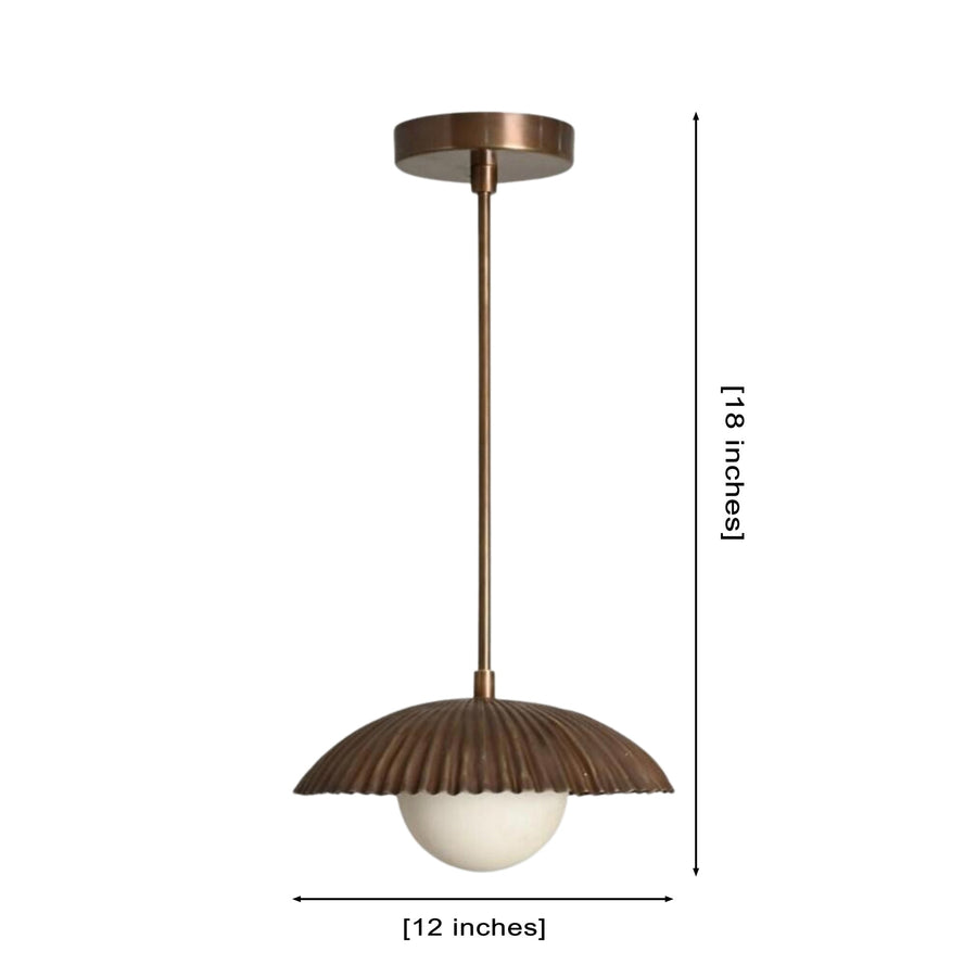 Verona Fluted Dome Pendant Light installed above a kitchen island in a warm contemporary kitchen, featuring a ribbed metal dome shade with a frosted globe diffuser providing soft ambient illumination.