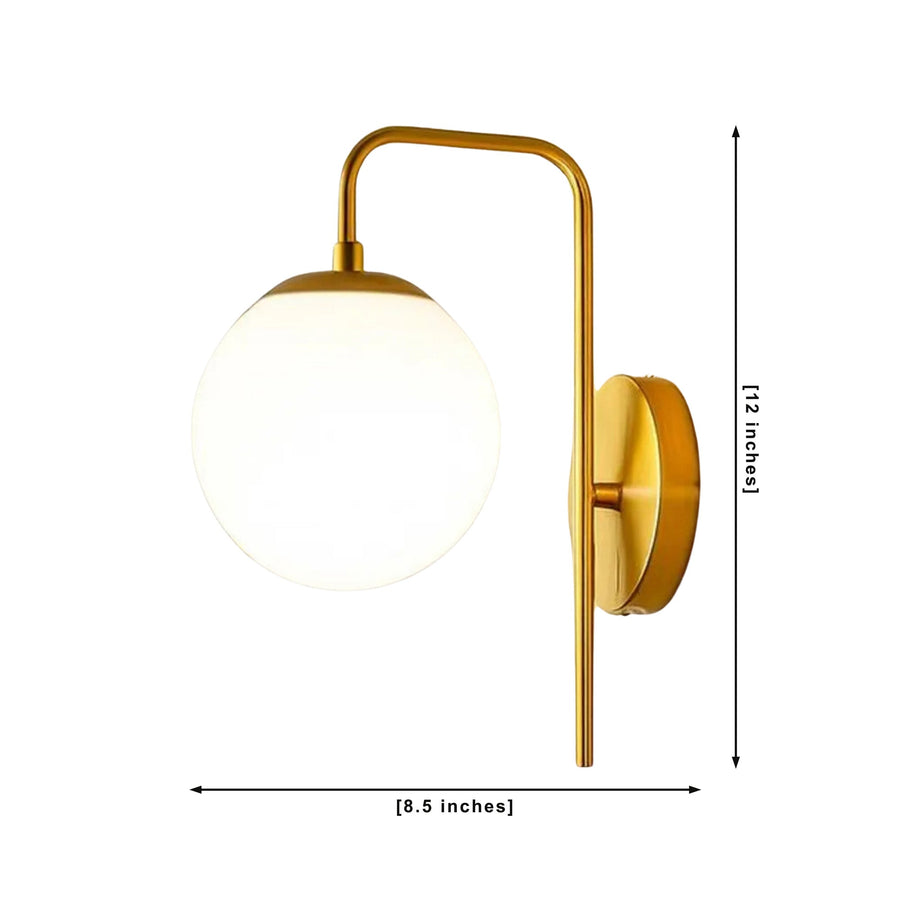 Verona brass globe wall sconce installed in a warm modern living room with soft ambient lighting – Model 32808